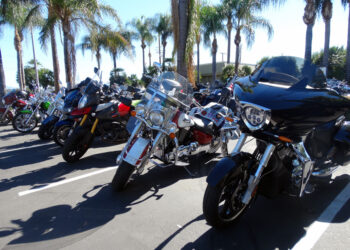 Motorcycles parked at Totally Kids